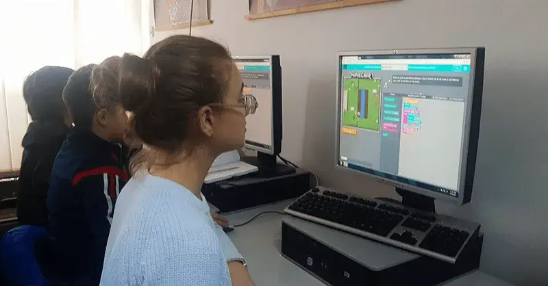 Students practising block-based coding in a Digital School classroom.